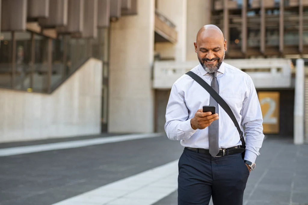 business man on phone walking