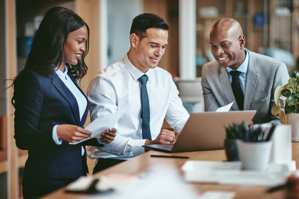 business people sitting at a desk working